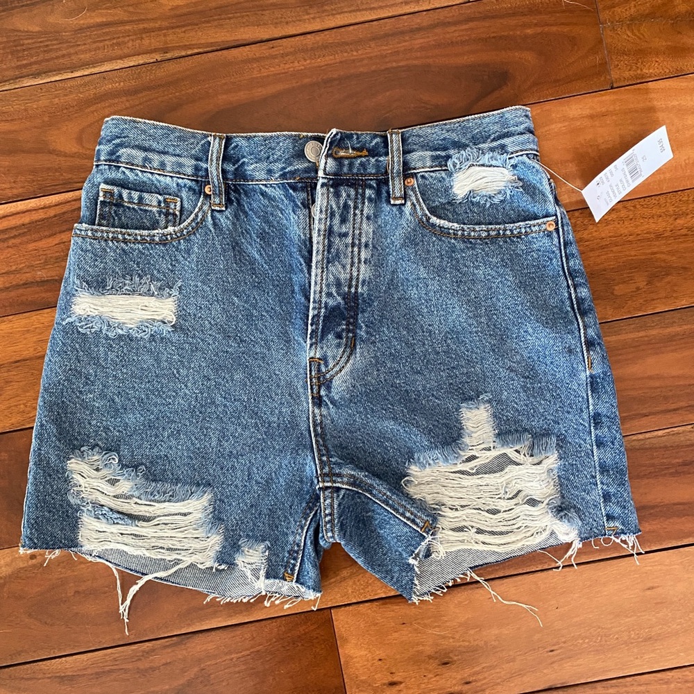 Medium blue ripped butterfly girlfriend denim shorts